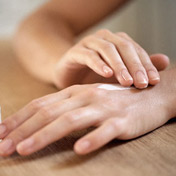 Rubbing Eczema Cream into Hands